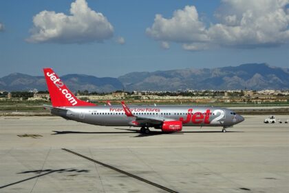 Jet2 aircraft on the tarmac, grey and red livery.