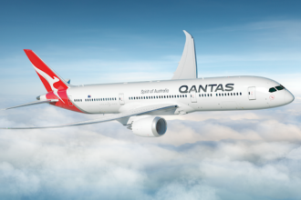 Qantas Boeing 787-9 Dreamliner flying above the clouds