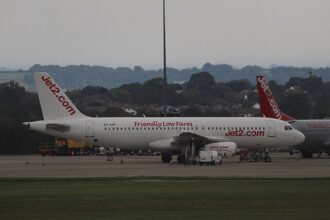 Jet2 achieves its fuel-saving strategy by using lightweight paint, resulting in significant weight savings and reduced fuel burn and emissions. 
