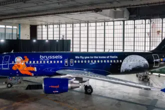 The new space-blue livery features the quote - "we fly you to the home of Tintin"