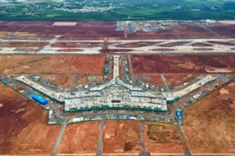 Long Thanh Airport construction showing terminal building and runway works supporting Vietnam aviation growth and the Vietnam aviation industry 2026.