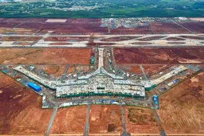 Long Thanh Airport construction showing terminal building and runway works supporting Vietnam aviation growth and the Vietnam aviation industry 2026.