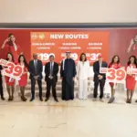 Bo Lingam, Group CEO of AirAsia X, and Tony Fernandes, Group CEO of Capital A, speaking during a route announcement.