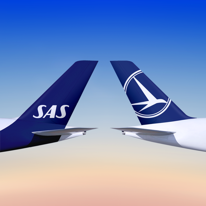 An image of two aircraft tails that belong to SAS and TAROM