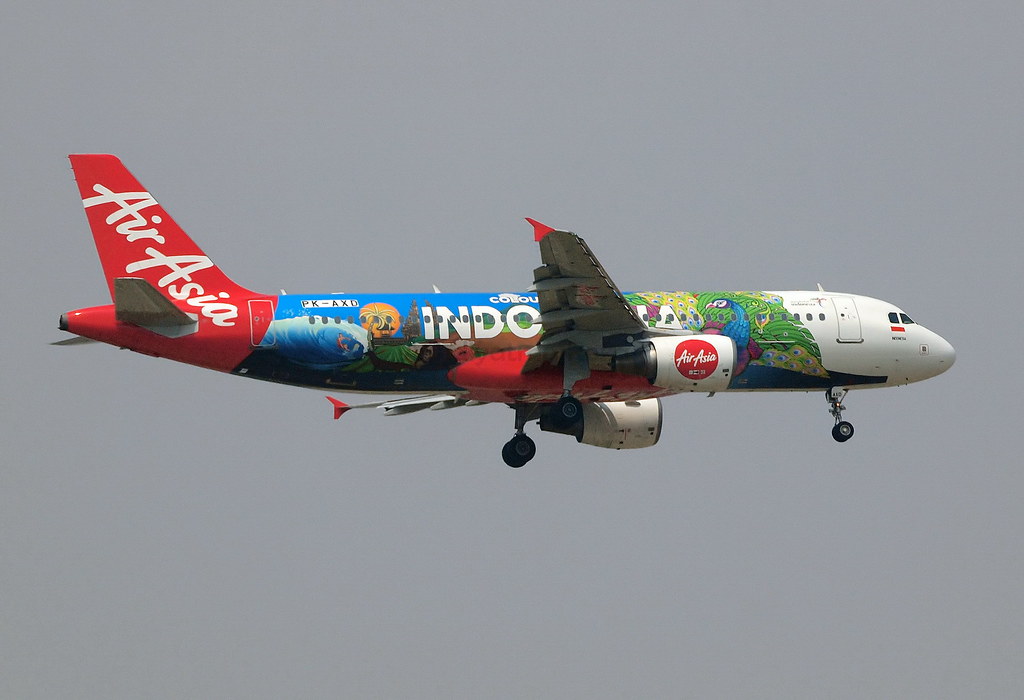 Indonesia AirAsia Airbus A320-200 flying in the air