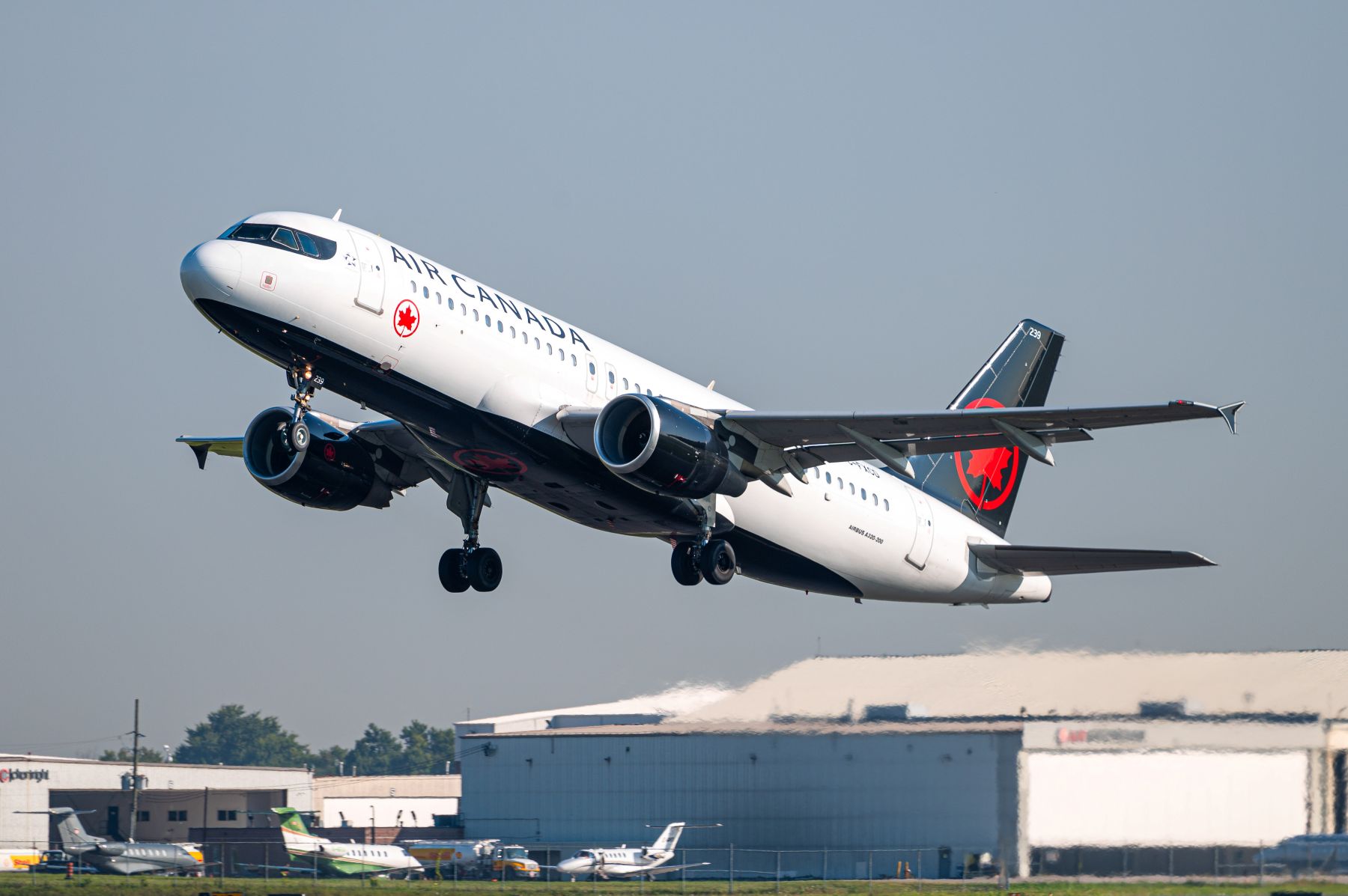 An image of an Air Canada Airbus 320 aircraft taking off