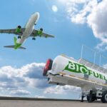 Aircraft flying above a biofuel tanker representing Australia China sustainable aviation fuel and aviation decarbonisation.