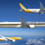 Boeing Singapore Airlines aircraft flying in the blue sky.