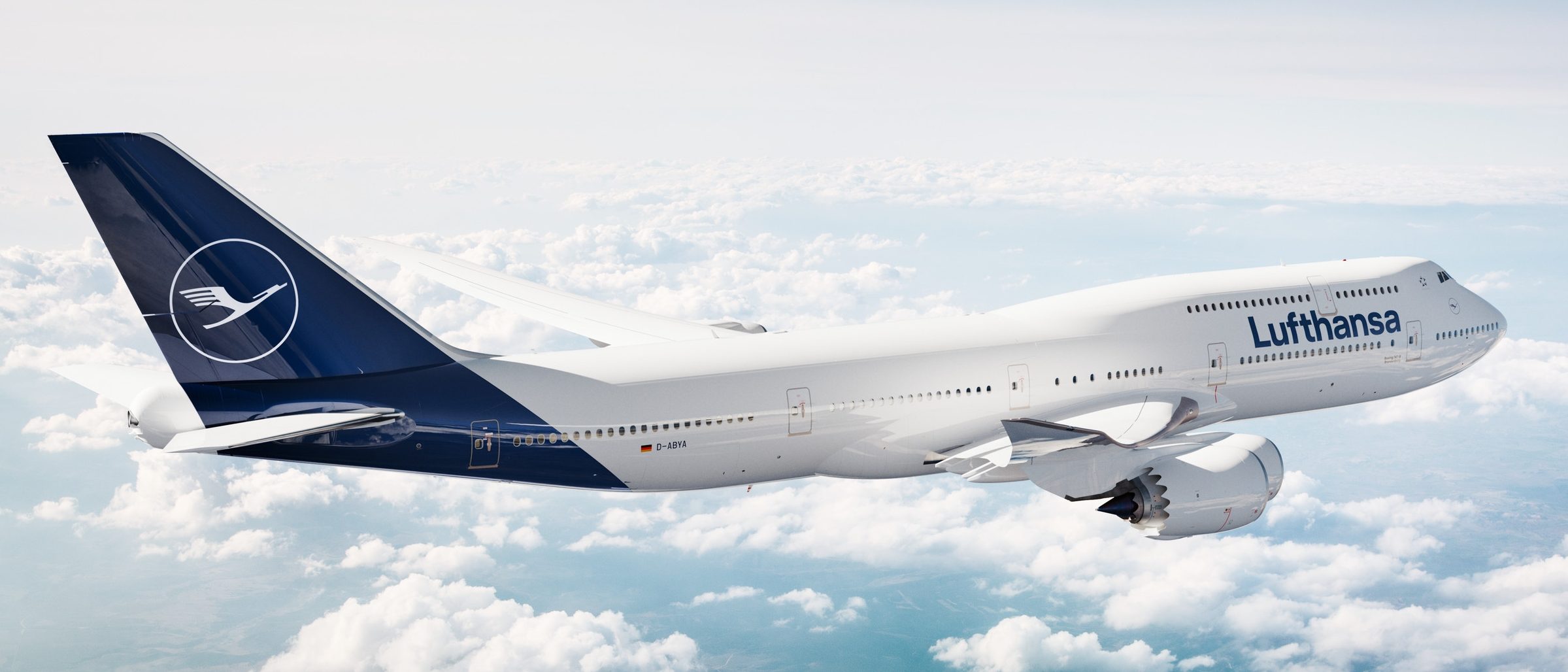 Lufthansa aircraft in flight over clouds
