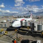 Image of London Heathrow Airport, with multiple planes prepping for departure