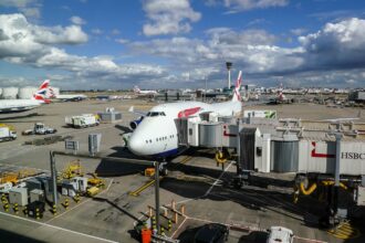 Image of London Heathrow Airport, with multiple planes prepping for departure
