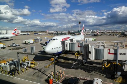 Image of London Heathrow Airport, with multiple planes prepping for departure