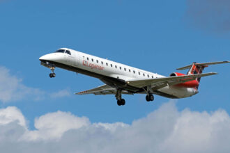 A Loganair Embraer ERJ-145EP in mid-flight.