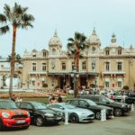 Luxury cars parek in front of a nice hotel in Monte Carlo