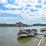 Cruise Ships on River in City