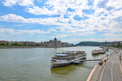 Cruise Ships on River in City