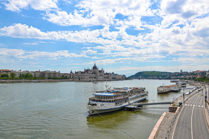 Cruise Ships on River in City