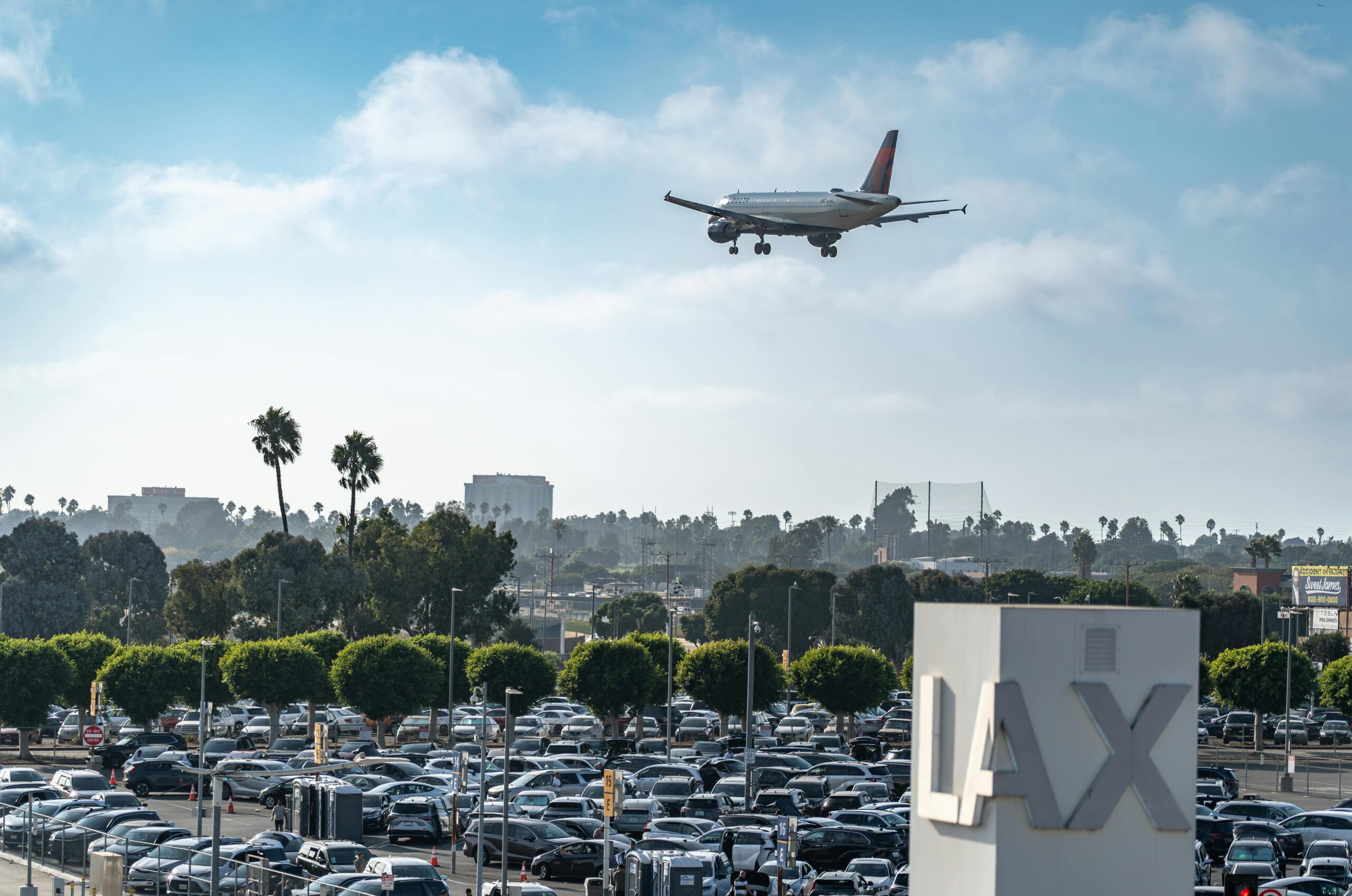 An aircraft flying above Los Angles International Airport (LAX), Los Angeles, California.