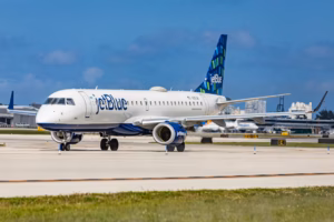 A jetblue plane on the runway