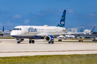 A jetblue plane on the runway
