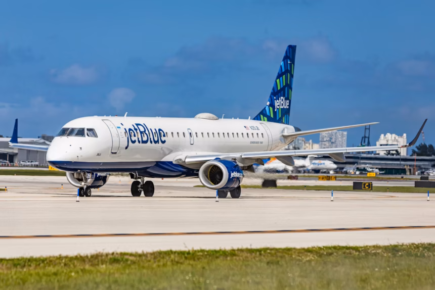 A jetblue plane on the runway