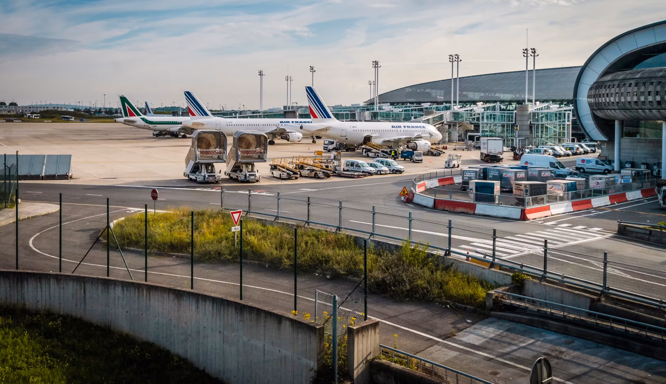 Exterior view of the terminal at Charles De Gaulle Airport (CDG) in Paris, France, where Air France planes are stopped.