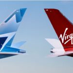 Two aircraft's tails with both Virgin Atlantic and WestJet's logos