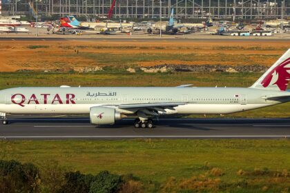 A Qatar Airways aircraft taxiing in the runway