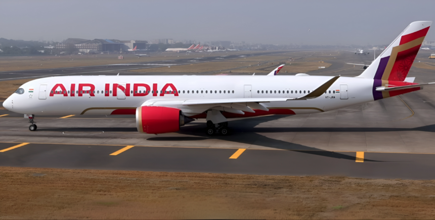 A sleek white Air India Airbus A350-900 taxis along a runway at an airport.