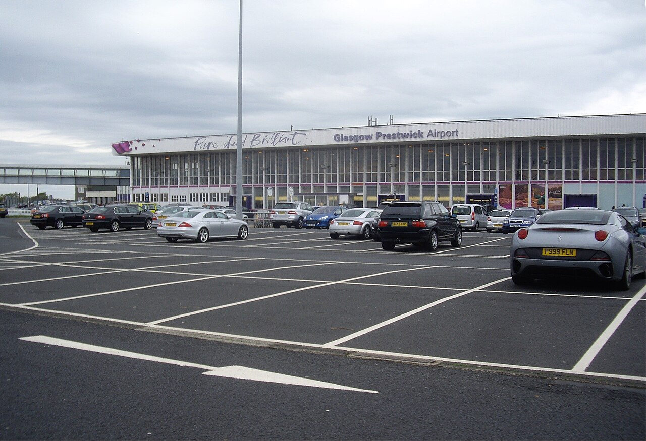 A wide-angle view of the car park outside the Glasgow Prestwick Airport 
