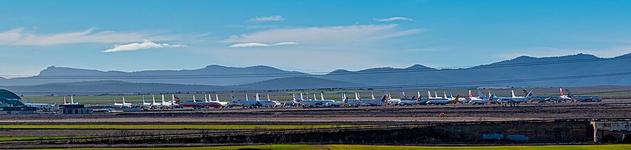 A wide panoramic view of the airport with flights parked in it