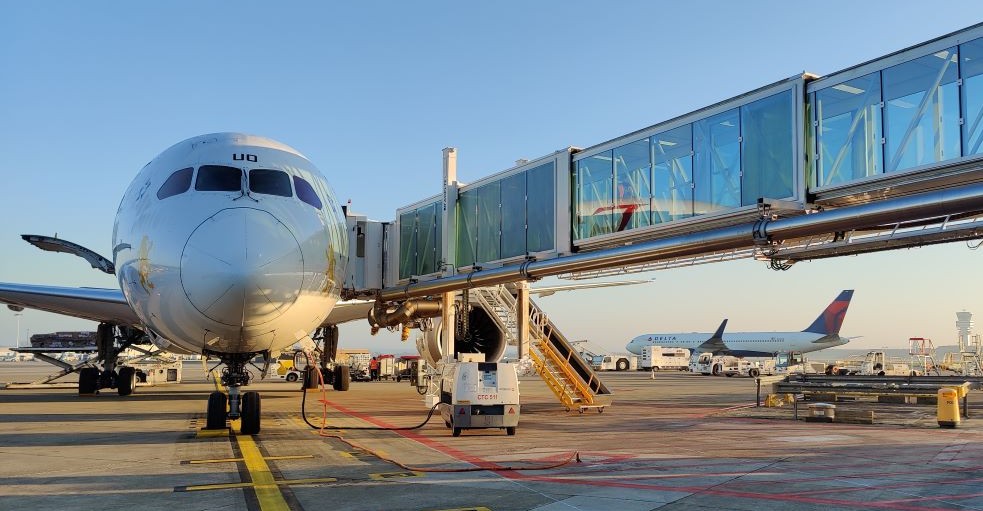 An aircraft parked at the tarmac
