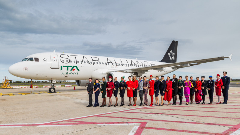 star alliance and ITA Airways crew alongside its aircraft 