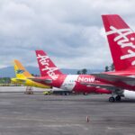 wide-angle shot features three aircraft parked on a tarmac at Kalibo International Airport (KLO) in the Philippines