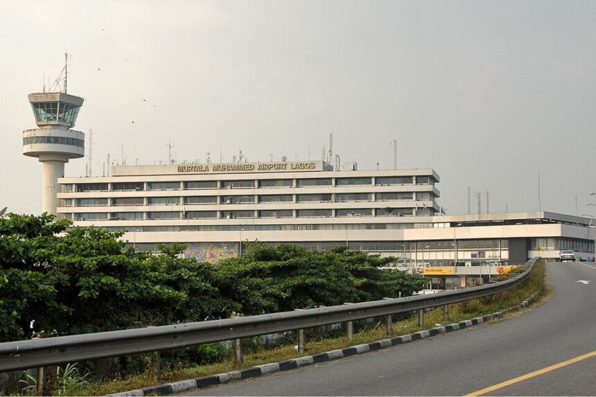 External view of the Murtala Muhammed International Airport (LOS) terminal in Lagos, Nigeria, under a hazy sky