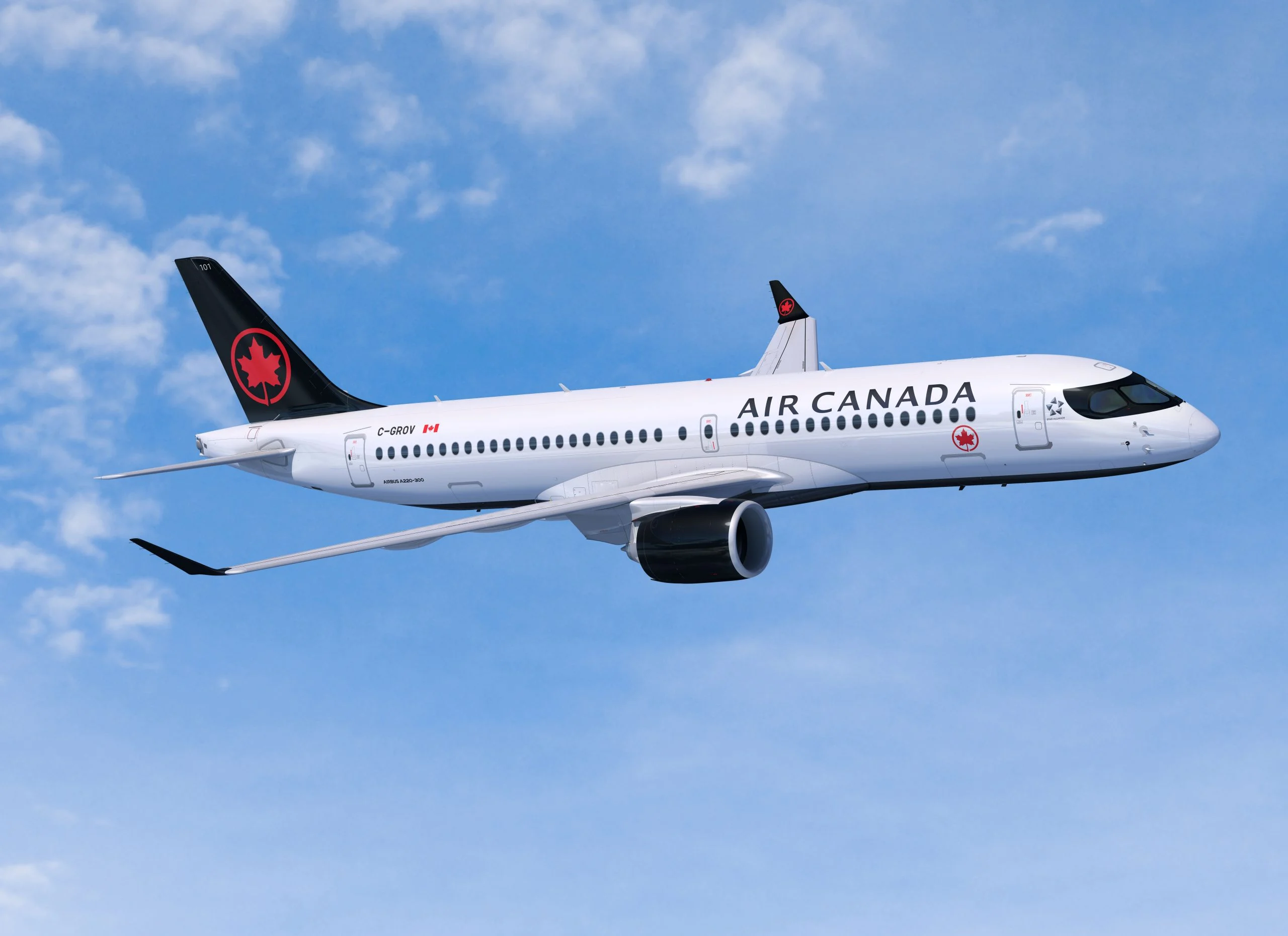 Air Canada's Airbus A220 flying in the blue sky.