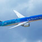 Air Tahiti Nui Boeing 787-9 Dreamliner flying on a cloudy sky