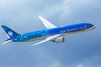 Air Tahiti Nui Boeing 787-9 Dreamliner flying on a cloudy sky