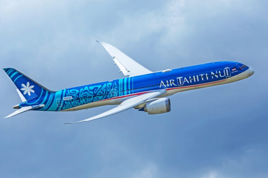 Air Tahiti Nui Boeing 787-9 Dreamliner flying on a cloudy sky