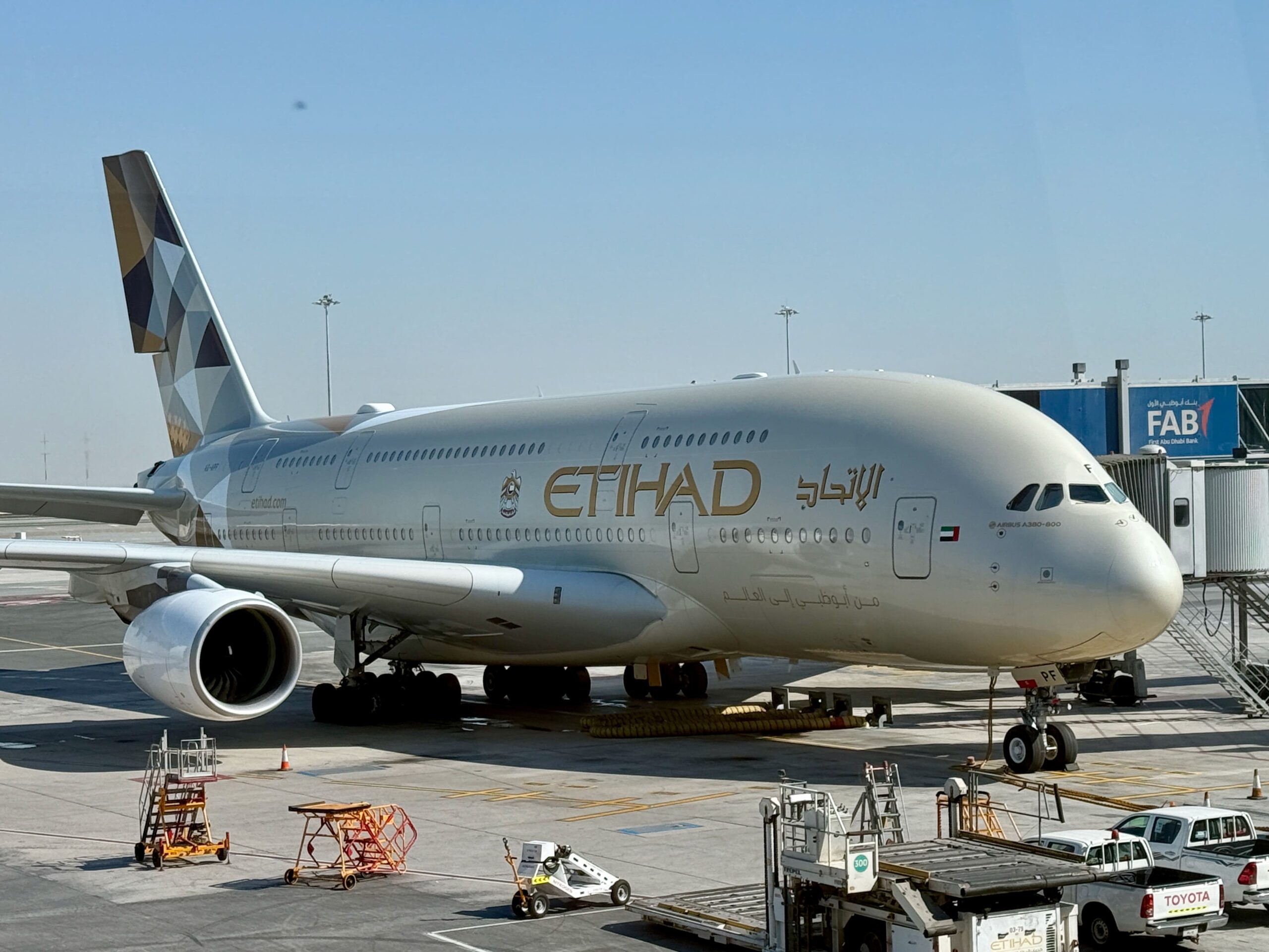 An Etihad Airways Airbus A380-800 parked on the tarmac.