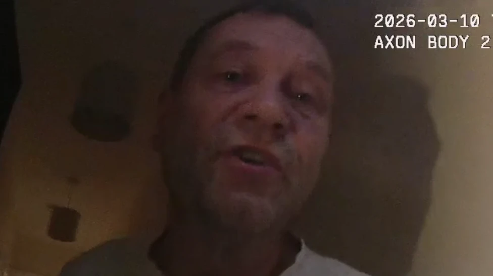 An up-close image of a man's face.