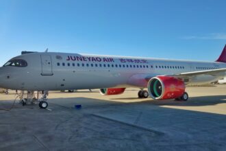 A Juneyao Air A321-200N in a stationary position.