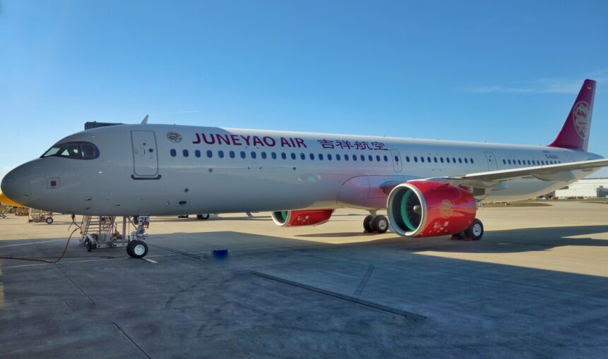A Juneyao Air A321-200N in a stationary position.