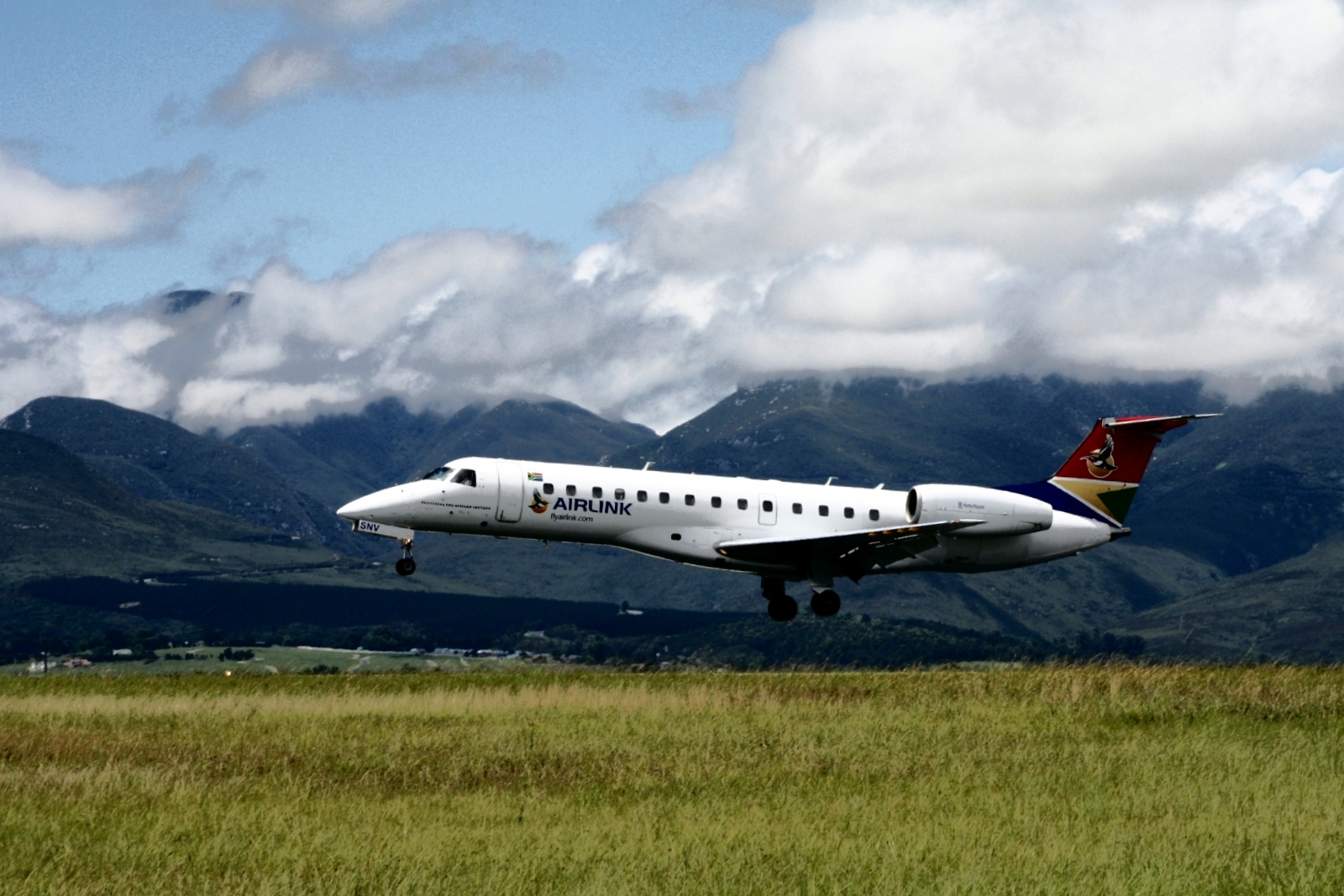 Airlink flight amongst mountains