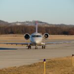 Image of CRJ200 from front on runway