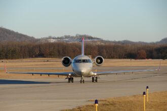 Image of CRJ200 from front on runway