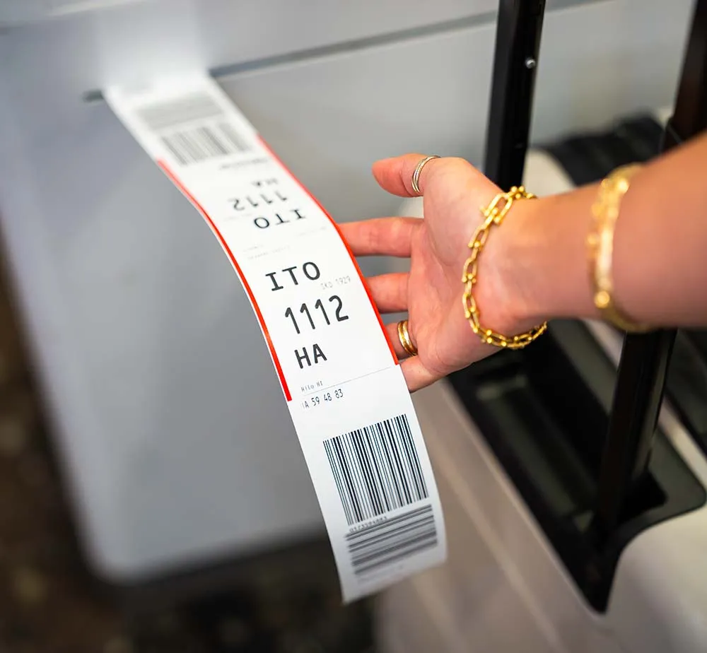 bag tag coming out of the machine