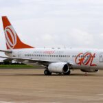 GOL Airlines Boeing 737-700 aircraft on the tarmac. White and orange livery.