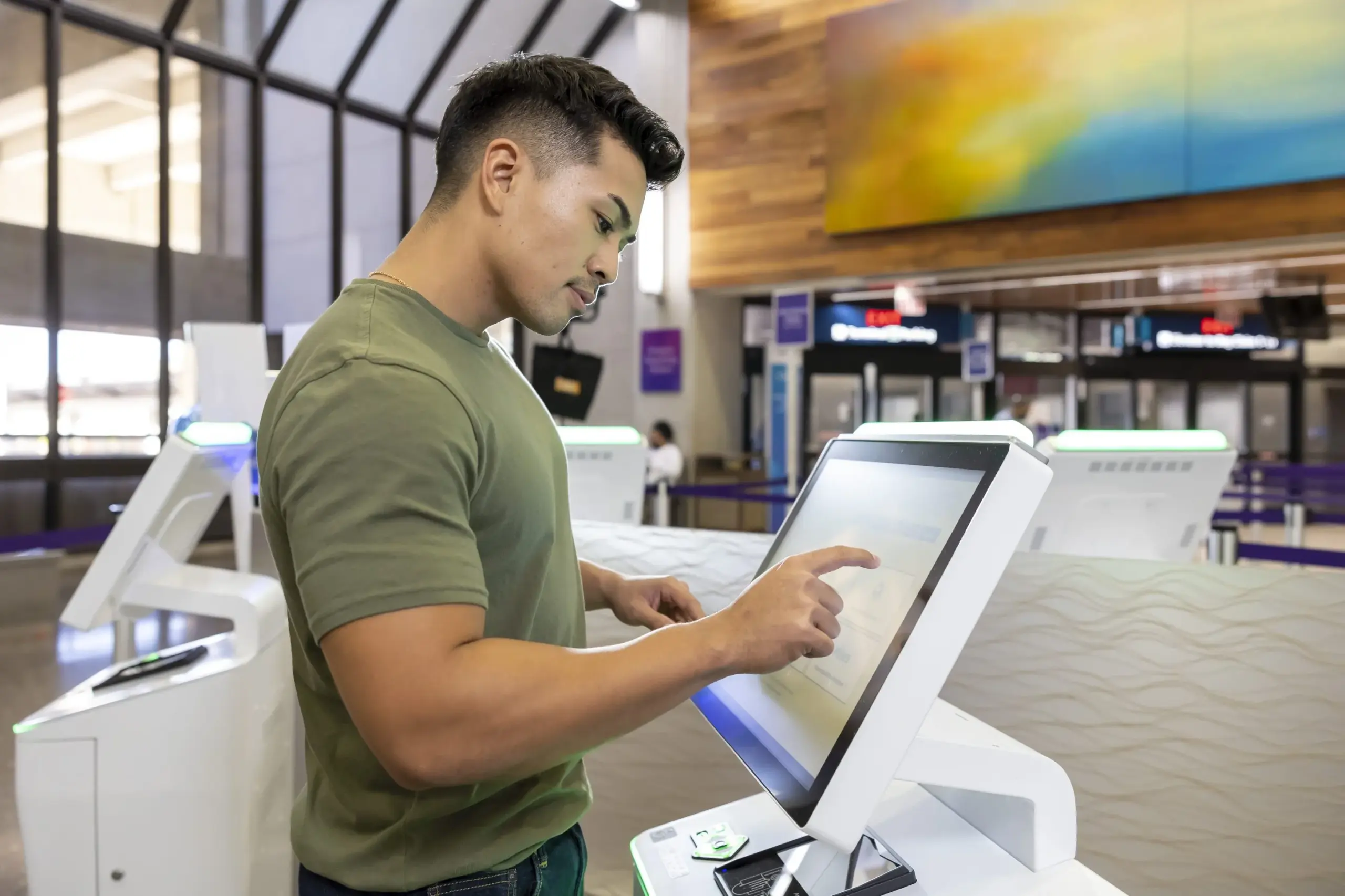 Man using kiosk 