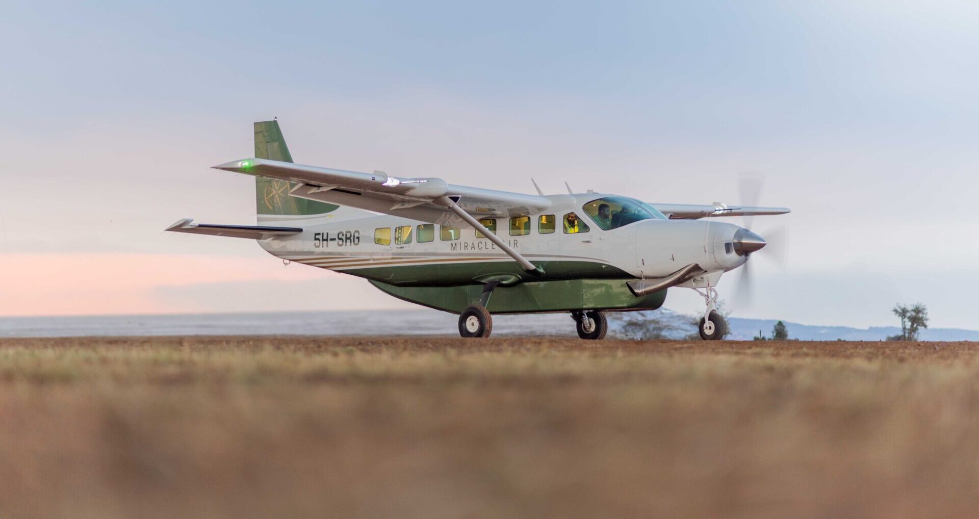 Miracle Air Dash 8 on the ground, camera level to the landing gear.